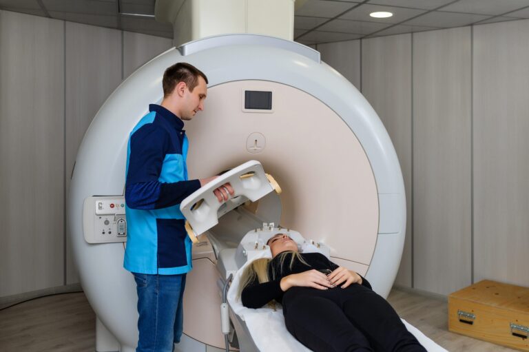 scanning patient on ge mri scanner with ge hnu coil